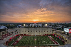 Aerial view of Indiana University Memorial Stadium at sunrise.